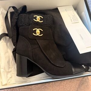 CHANEL Black Heeled Boots with Gold Logo